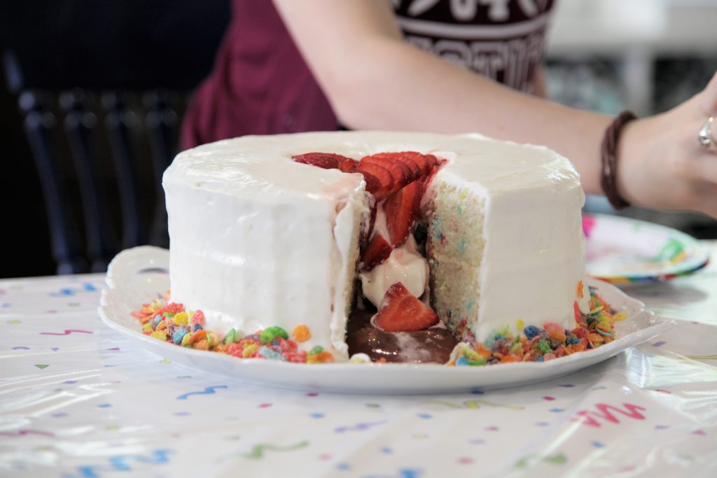 Slime Surprise Cake cut, with slime oozing out